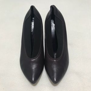 Italian leather pointy bootie heels.